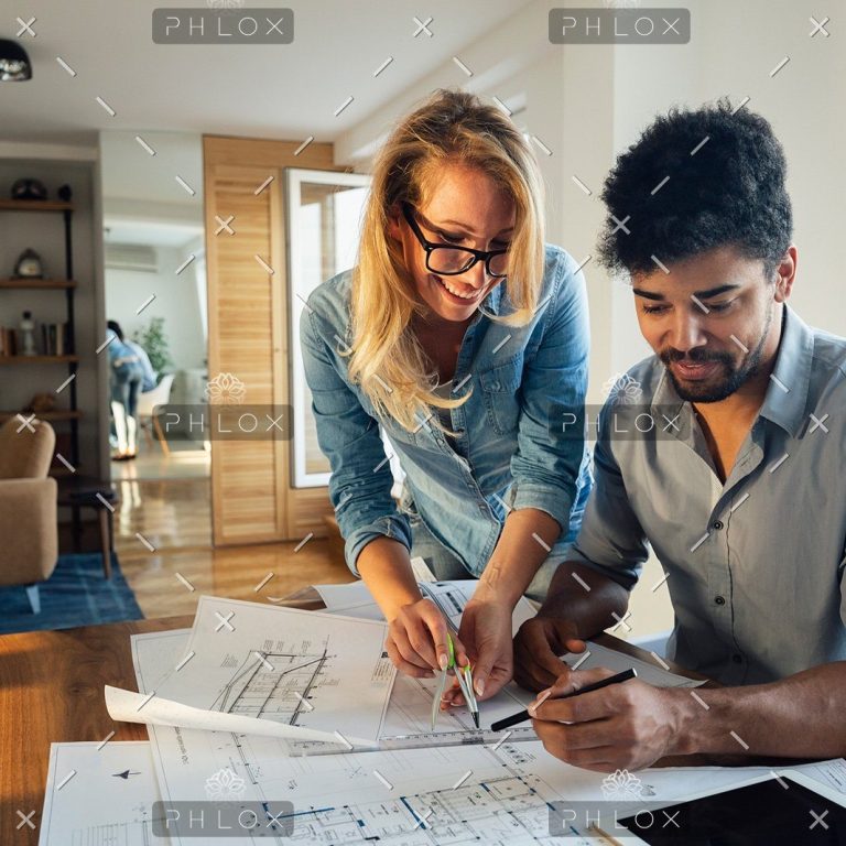 demo-attachment-466-architect-colleagues-working-in-office-HMYR4KD