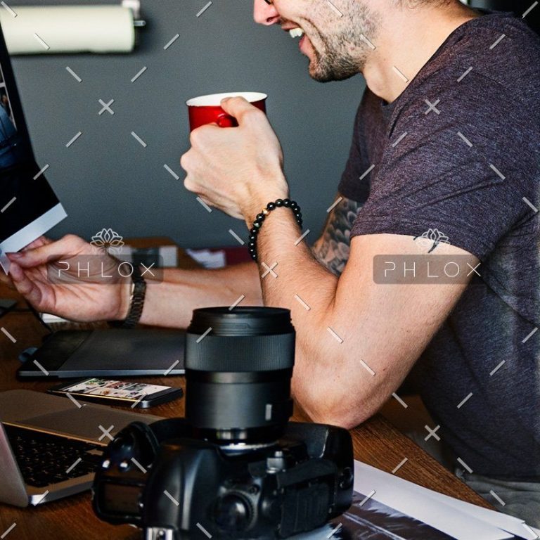 demo-attachment-485-photographer-journalist-working-studion-agency-PWTYFR5